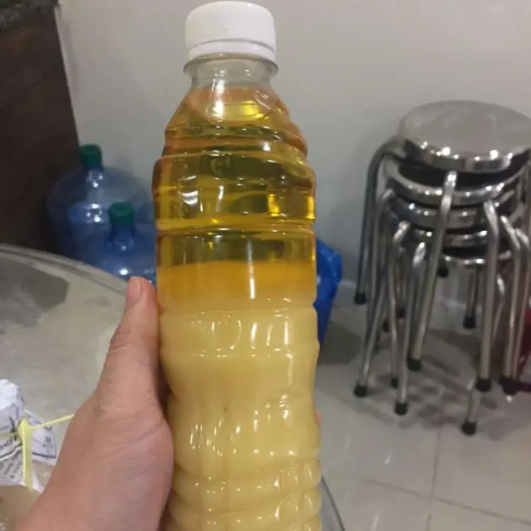 روغن حیوانی در بطری شیشه‌ای با برچسب طبیعی